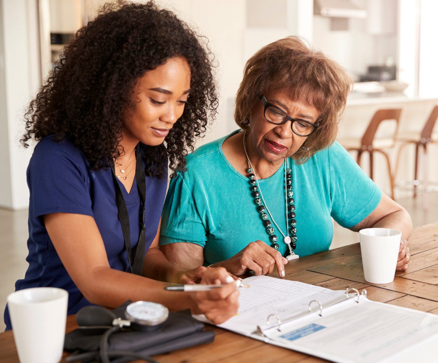 Provider and patient reviewing documentation.